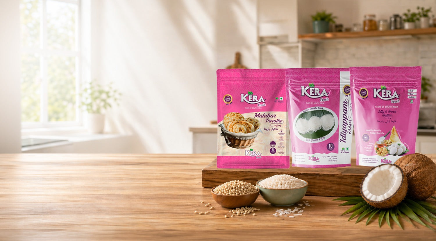 Assorted South Indian foods including soft parotta, idiyappam, and fresh rice and dosa batter displayed on a home page banner by Kera Fresh